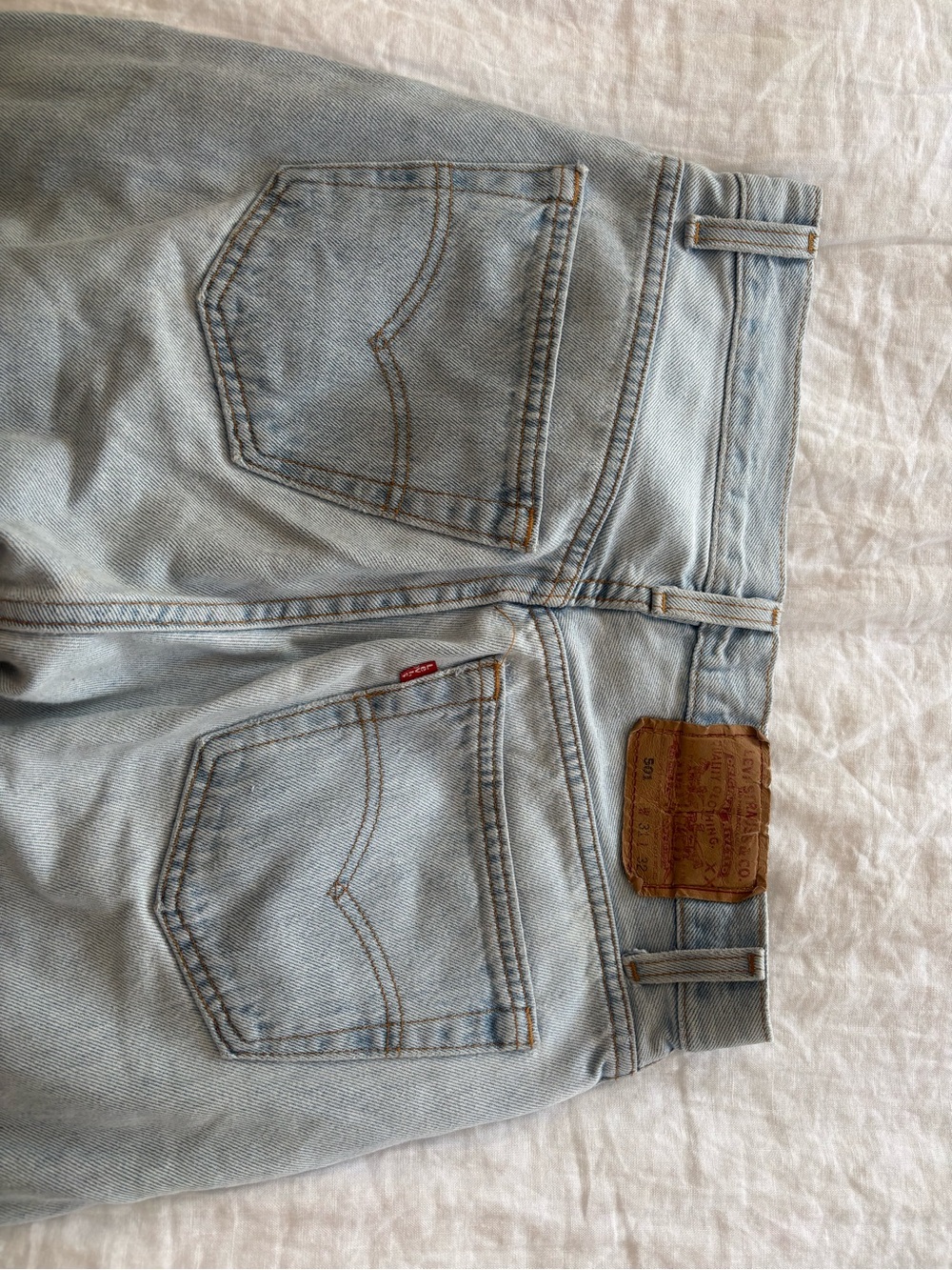 Levi’s 501 light wash straight leg jeans